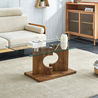 A rectangular modern and fashionable coffee table with tempered glass tabletop and wooden color MDF legs. Suitable for living room.47.2"*25.5"*18"