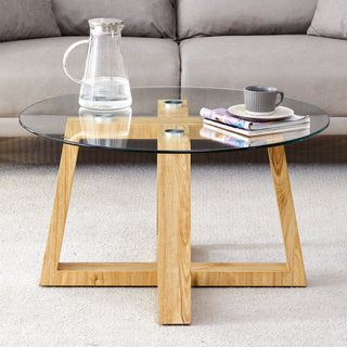 Modern practical circular coffee tables. Made of transparent tempered glass tabletop and wood colored MDF material. Suitable for living rooms and bedrooms.31.5"*31.5"*17.7"