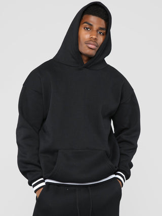 Men? Minimalistic Loose Pullover Hoodie With Front Pocket And A Stripped Hem