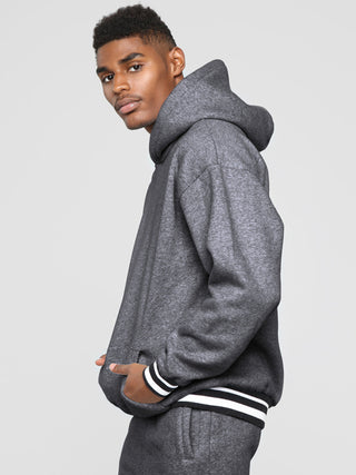 Men? Minimalistic Loose Pullover Hoodie With Front Pocket And A Stripped Hem